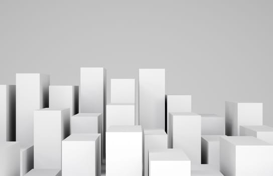 Many white cubes on gray background. Cropped image. Concept of urban construction