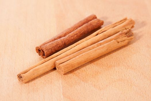 Cinnamon bark on a wooden table top