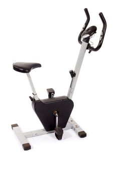 Stationary bike, gym machine on white