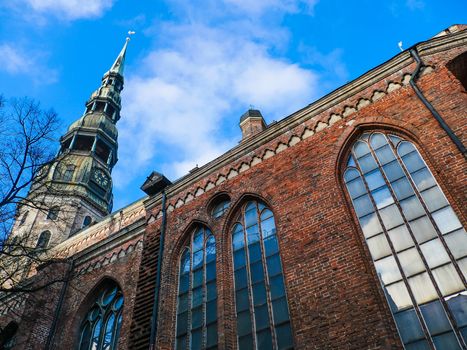 Latvia Riga City's historical center - Unesco world heritage site Saint Peter's Church and Hanseatic style building