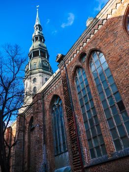 Latvia Riga City's historical center - Unesco world heritage site Saint Peter's Church and Hanseatic style building
