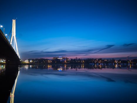 View of Riga river and Vansu Bridge in evening