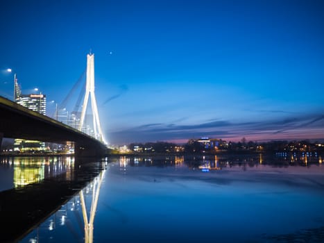View of Riga river and Vansu Bridge in evening