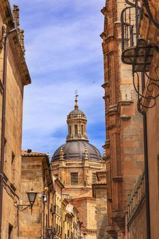 Stone Dome New Salamanca Cathedral Street Spain.  The New and Old Cathedrals in Salamanca are right next to each other.  New Cathedral was built from 1513 to 1733 and commissioned by Ferdinand V of Castile, Spain. 