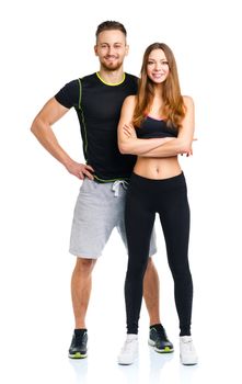 Sport couple - man and woman after fitness exercise on the white background