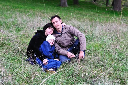 happy family in forest in early autumn