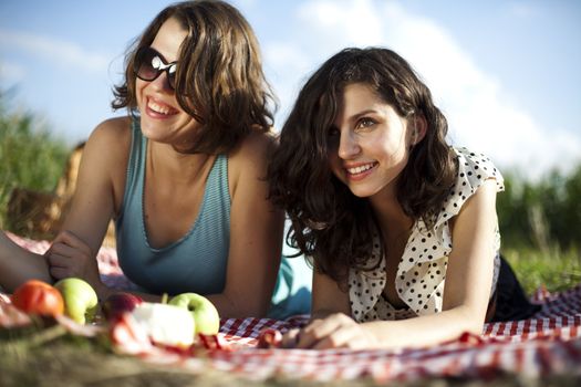 Young women on nature picnic