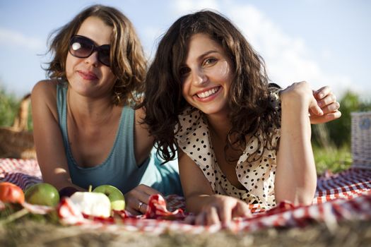 Young women on nature picnic