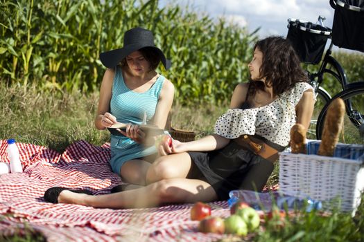 Girls on picnic, summer free time spending