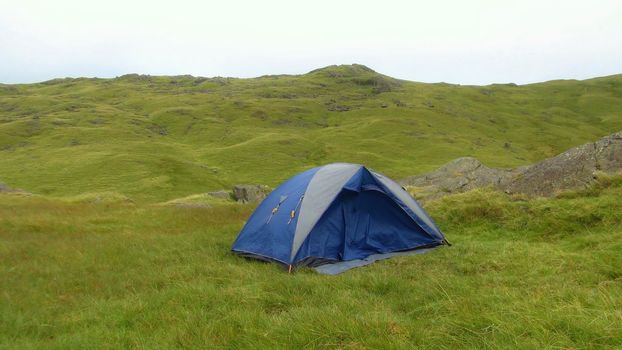 Camping tent in a field