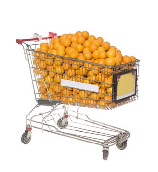 Shopping Cart with a large group of Oranges isolated on white background