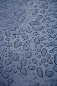 Full Frame of Water Drops on blue background