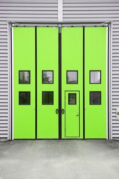 Green Garage Door on a warehouse building