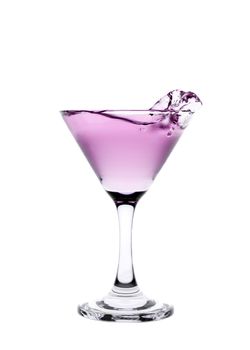 Pink liquid splashing in a martini glass isolated on white background