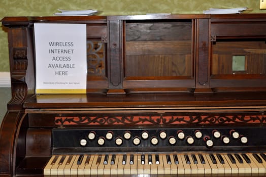 antique piano with internet access poster