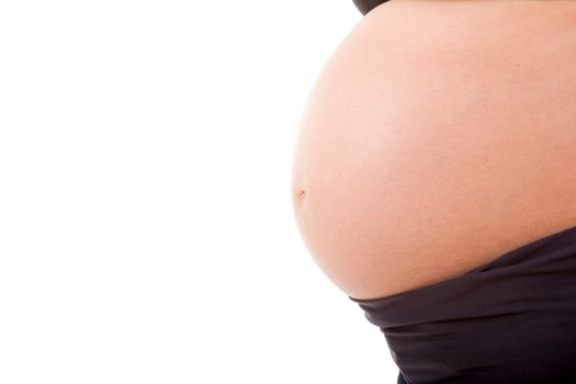 Closeup of pregnant woman at white background