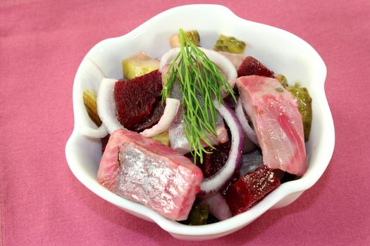 Matie salad with beetroot, onions and pickles