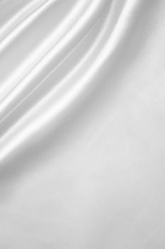 Smooth elegant white silk or satin can use as wedding background 