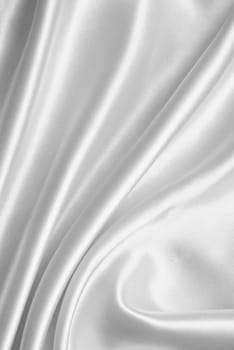 Smooth elegant white silk or satin can use as wedding background 