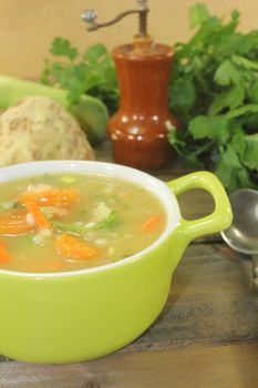 delicious rustic barley porridge with vegetables and parsley