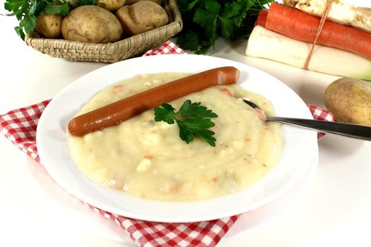 hearty potato soup with Wiener sausages and vegetables