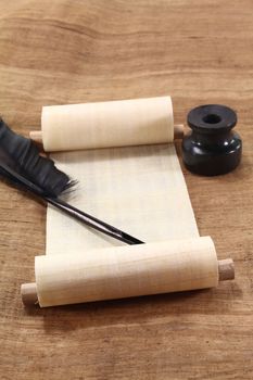 Papyrus scroll with quill pen and inkwell