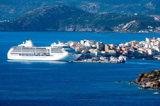 White passenger ship off the coast of Agios Nikolaos. Crete, Greece
