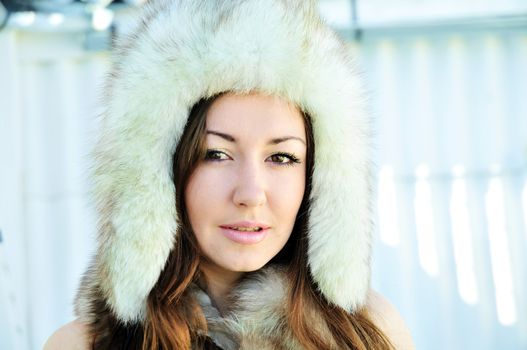 brunette girl wearing fur hat