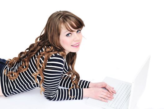 pretty curly girl with laptop laying and smiling