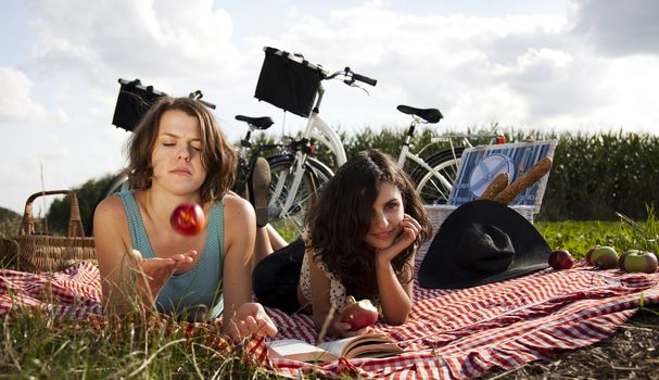 Girls on picnic, summer free time spending