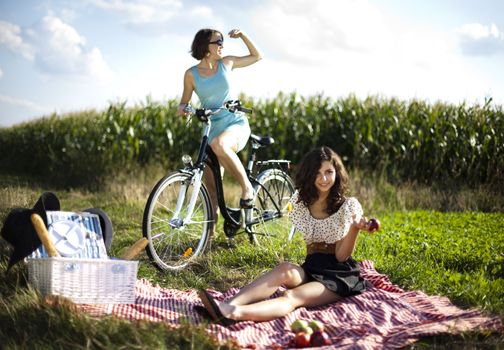 Girls on picnic, summer free time spending