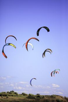 Kitesurfers in the beach of Rosignano, Italy