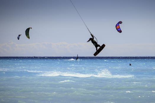 Kitesurfers in the beach of Rosignano, Italy