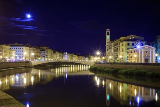 A nocturnal view of one of the bridges in Florence, Italy