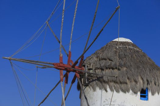 Detail of one famous windmill of Mykonos, Greece during a clear and bright summer sunny day 