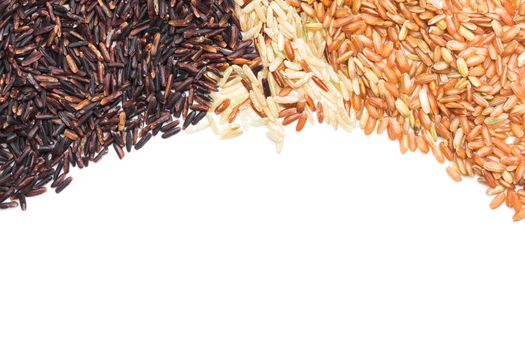 Various kinds of rice on white background copy space