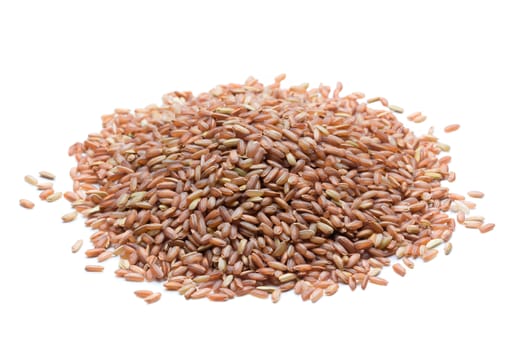 pile of brown rice isolated on white background