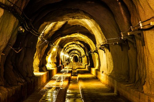 cave tunnel mine long walk way with light 