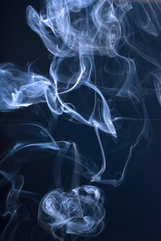 The Abstract smoke art on black background