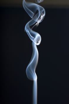The Abstract smoke art on black background