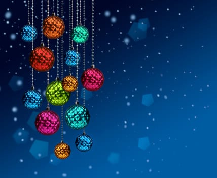 Group of colorful Christmas glass decoration balls on blue snowfall background