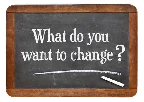 What do you want to change? A question on a vintage slate blackboard.