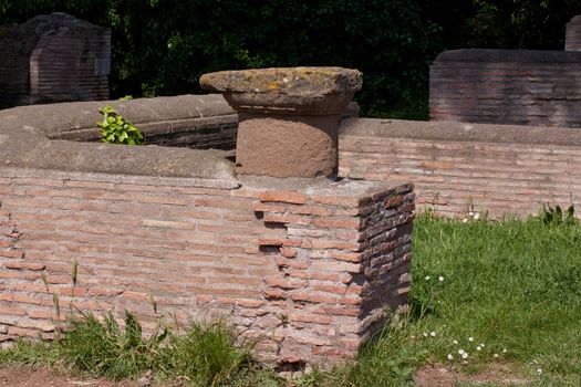 Old roman ruins in Ostia Antica near Roma
