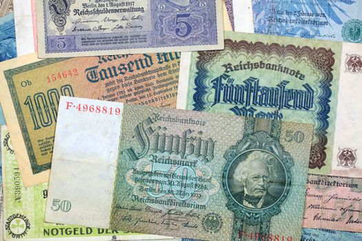 A collection of different historical banknotes from the depression in the twenties.