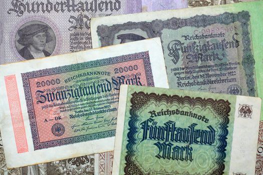 A collection of different historical banknotes from the depression in the twenties.