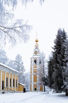 White and yellow church in winter in Uglich
