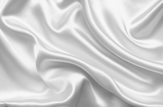 Smooth elegant white silk or satin can use as wedding background 