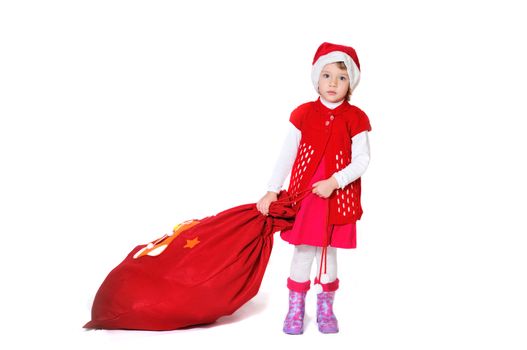 little santa girl with bag of presents