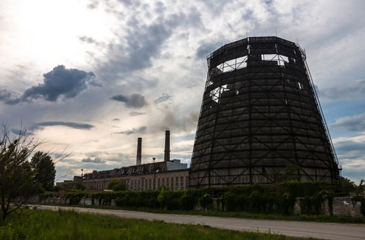 Old and damaged cooling tower of the cogeneration plant in Kyiv, Ukraine.