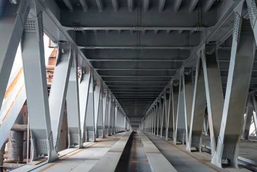 Bridge construction. Metal framework of the bridge